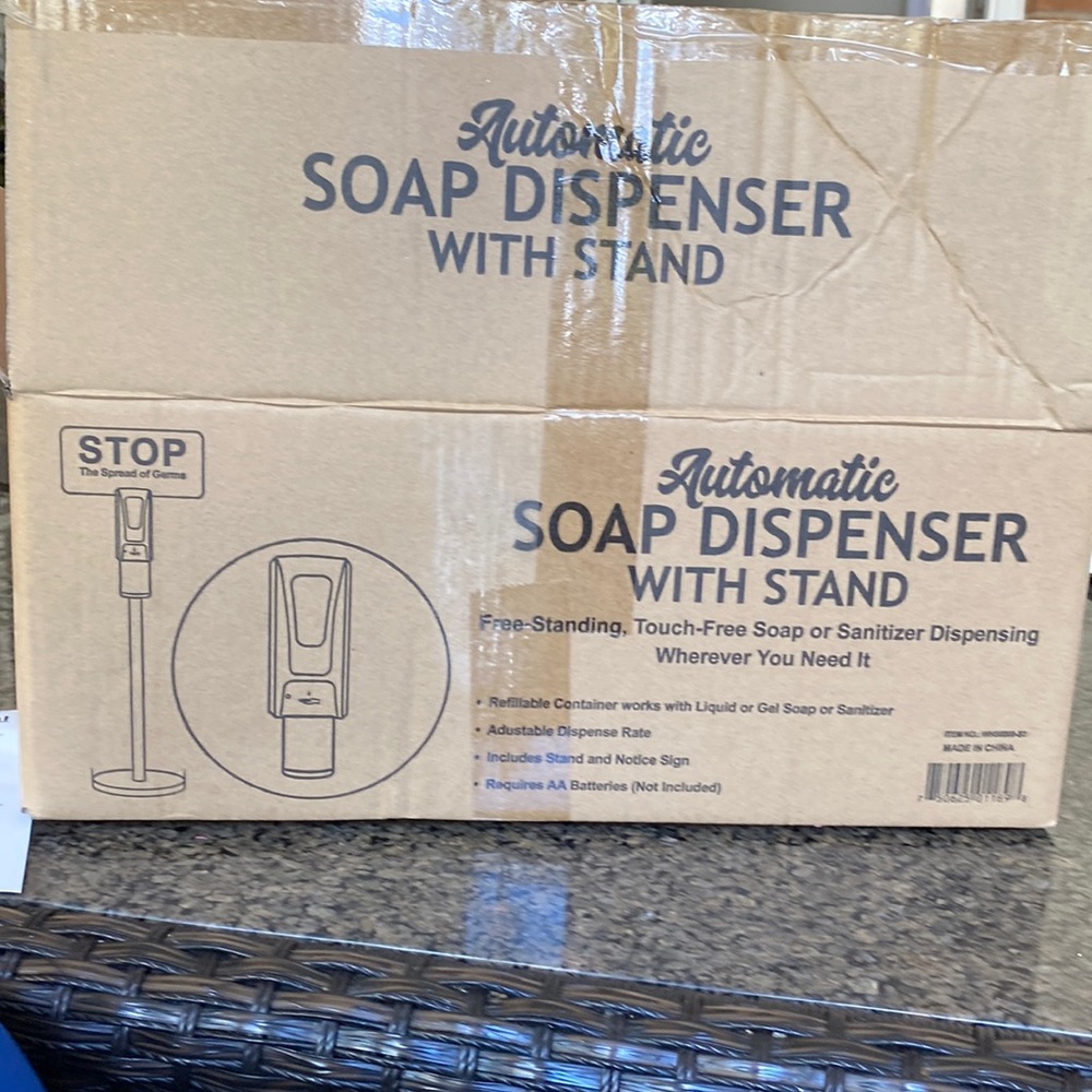 Automatic  soap  dispenser  with  stand.